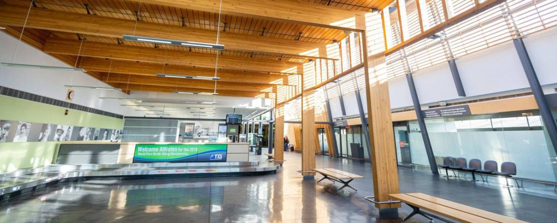 Image of inside of the Prince George Airport depicting wood architecture